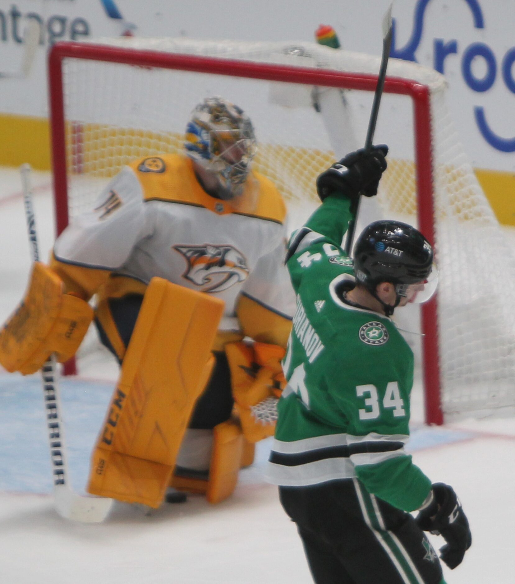 Dallas Stars forward Denis Gurianov (34) raises his stick after scoring against Nashville...