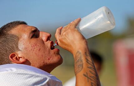 Gainesville State School football player Brandon gets some water during practice  on Oct....