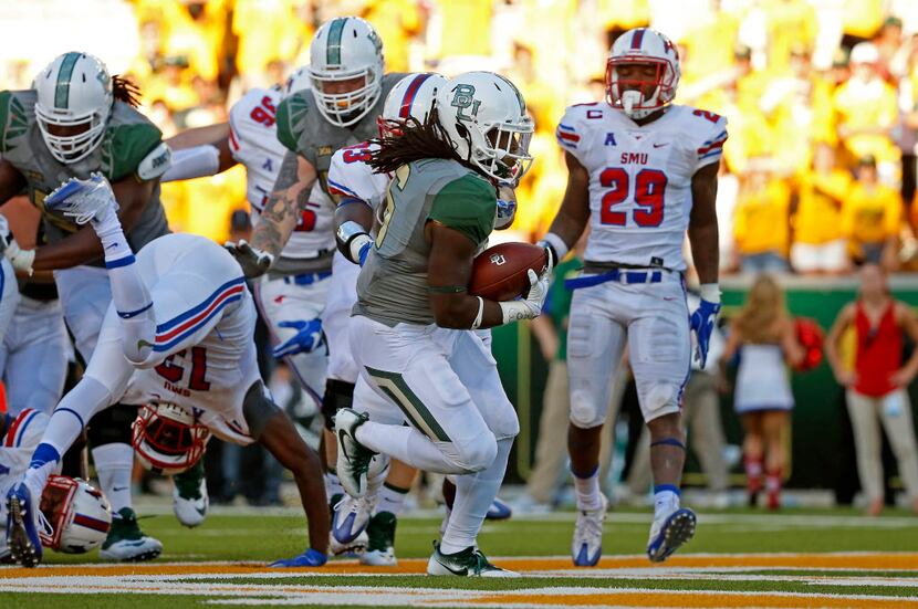 Baylor running back JaMycal Hasty (6) scores a touchdown against SMU during the fourth...