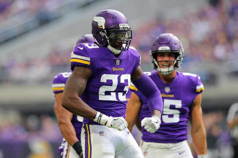 MINNEAPOLIS, MN - OCTOBER 14: George Iloka #23 of the Minnesota Vikings celebrates after...