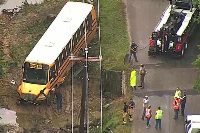  At least two people were injured after a school bus veered into a ditch Monday morning. (NBC5)