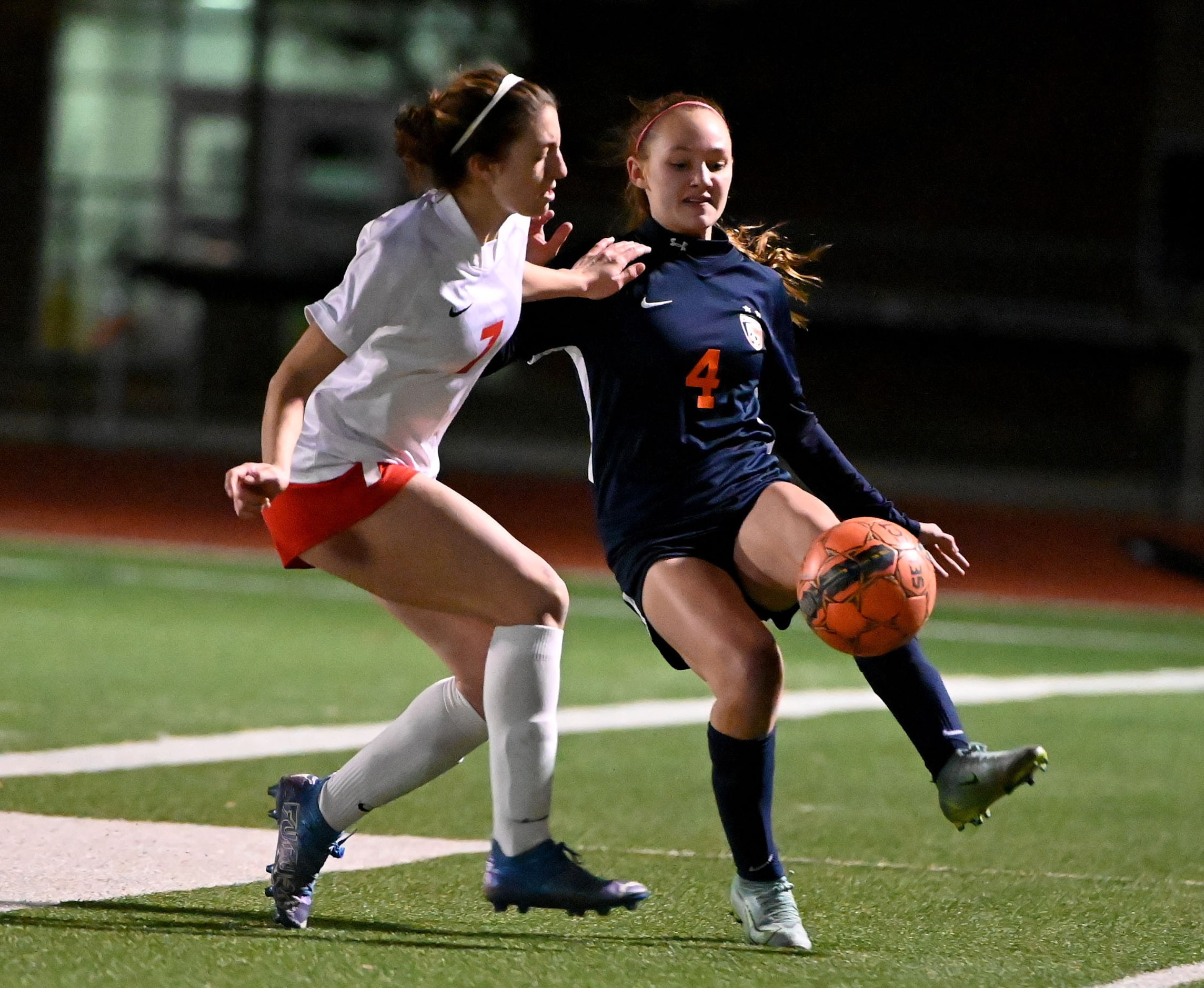 Frisco Centennial’s Bella Carrillo (7) and Frisco Wakeland’s Lauren Vacek (4) go after a...