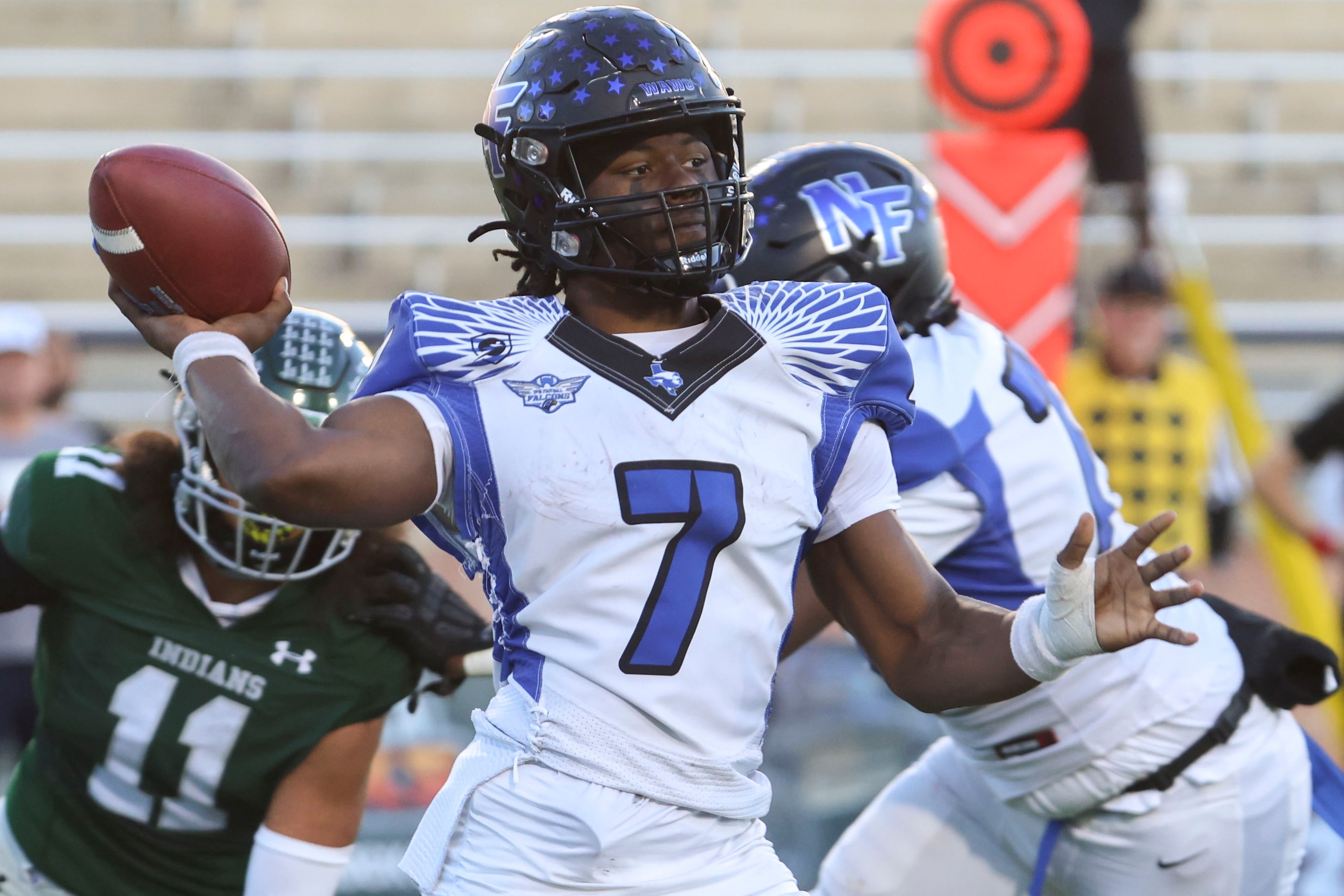 North Forney High’s QB Legend Bey throws the ball against Waxahachie High during the second...