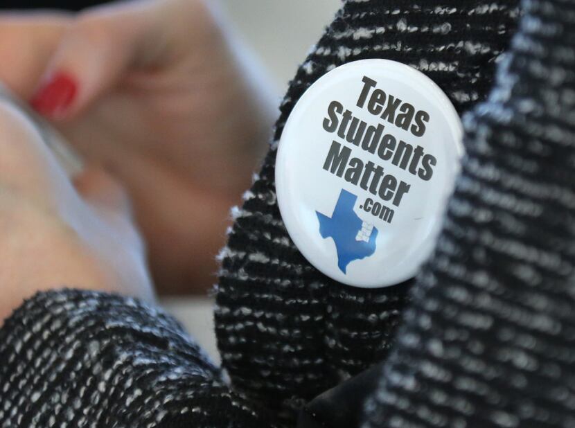 North Texas superintendents and trustees wore "Texas Students Matter" buttons during a press...
