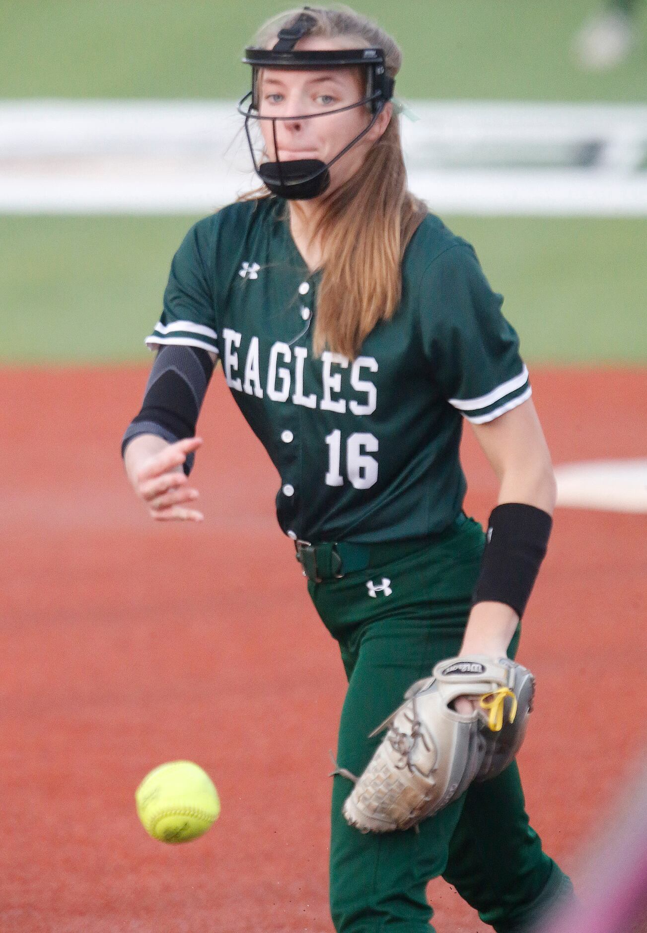 Prosper High School pitcher Elissa Griffin (16) delivers a pitch in the first inning as...