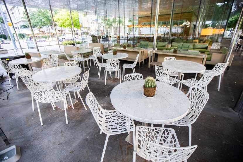 A patio dining area in Klyde Warren Park sat empty in 2020.