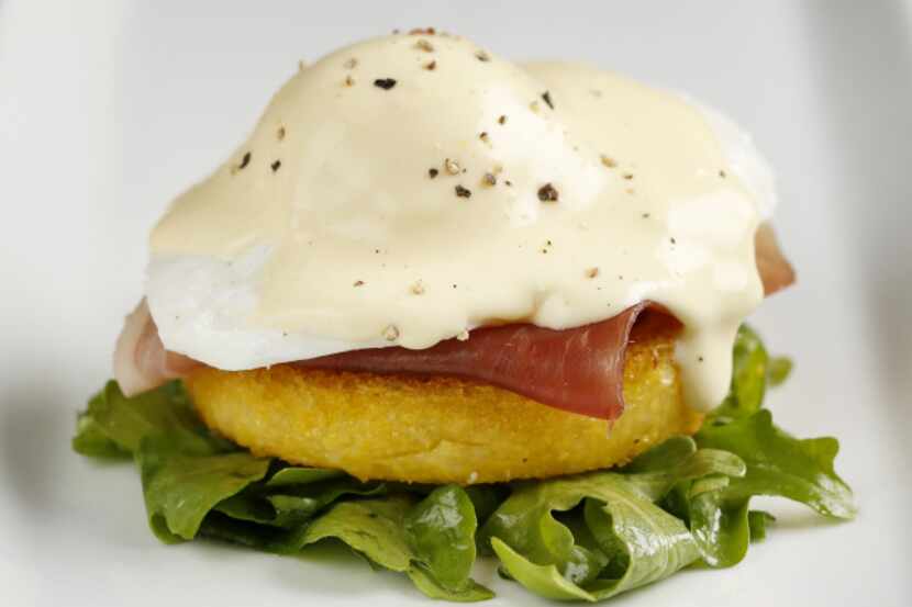 Dress arugula with vinaigrette and pile on polenta and prosciutto, the egg and hollandaise...