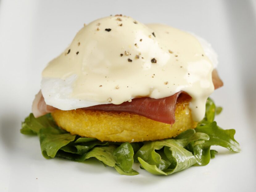 Dress arugula with vinaigrette and pile on polenta and prosciutto, the egg and hollandaise...