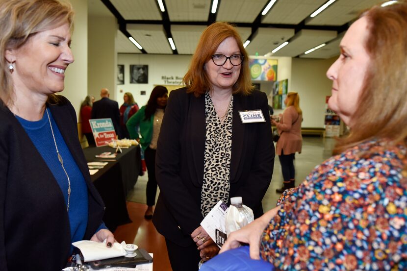 Candidate Nancy Cline (center) meets with voters Connie Nottoli, left, and Barbara...