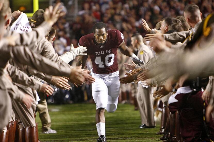 
Von Miller slapped hands with members of the Corps of Cadets before the Aggies’ 2010 game...