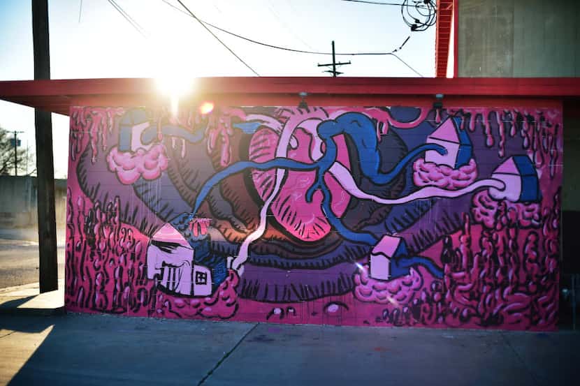 This mural on the side of Rubber Gloves Rehearsal Studio was painted by artist and musician...