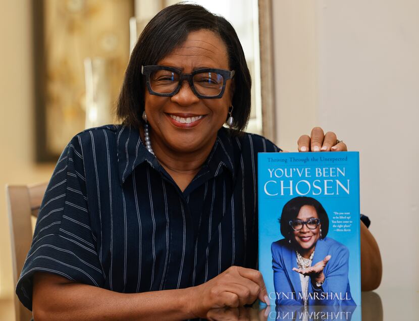 Cynt Marshall, CEO of Dallas Mavericks, posed with a copy of her new autobiography You’ve...