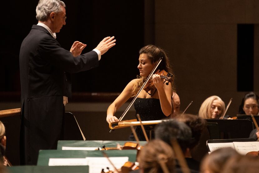 Music director Fabio Luisi conducts the Dallas Symphony Orchestra with violin soloist Nicola...
