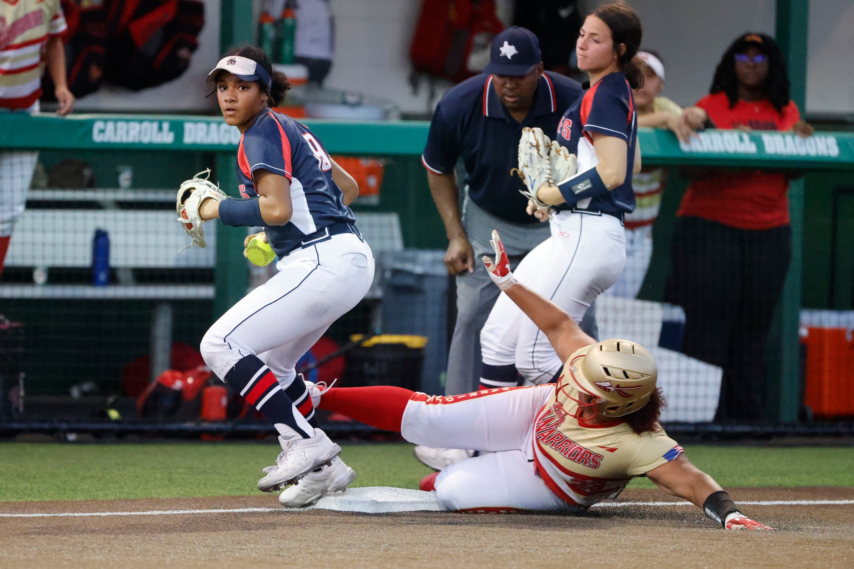 Allen’s Micaela Booth (19) forces South Grand Prarie’s Kiya Jones (23) out at third during...