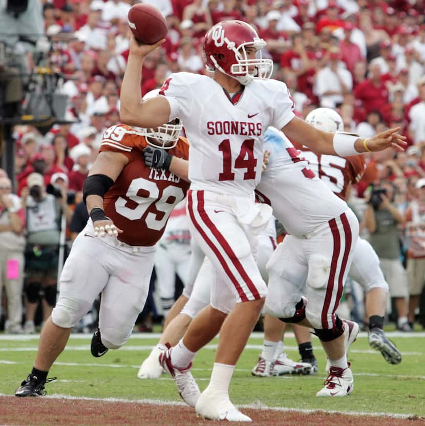 OU QB Sam Bradford fires a pass in the fourth quarter  in the Sooners 28-21 win over UT...