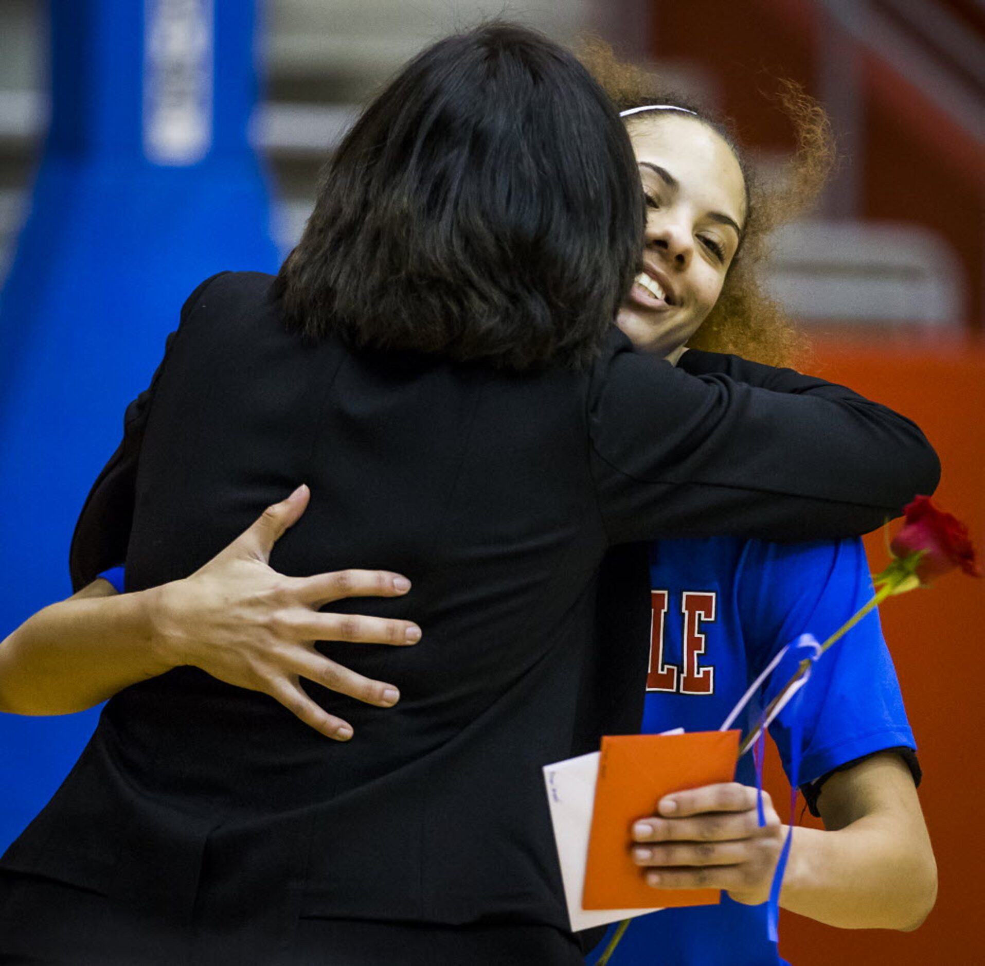 Duncanville forward Madison Townley hugs coach head coach Cathy Self-Morgan before a girls...