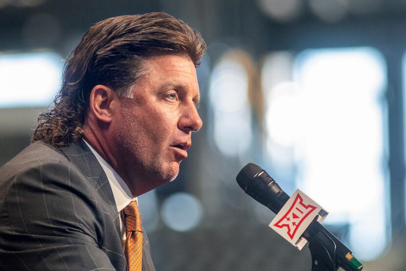 Oklahoma State University head football coach Mike Gundy speaks during the Big 12 Conference...