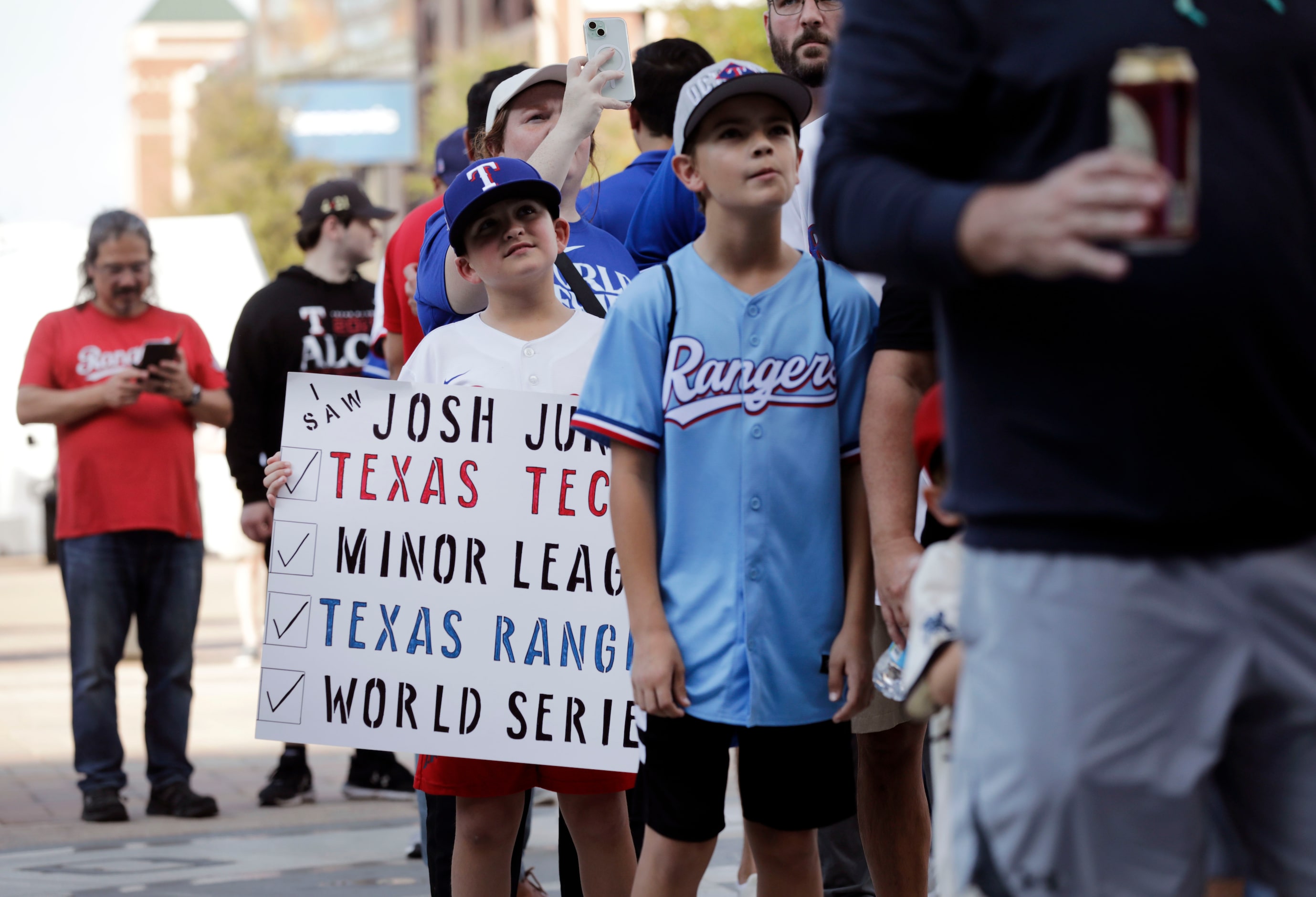 Texas Rangers fans file into Globe Life Field in Arlington before Game 1 of the World Series...