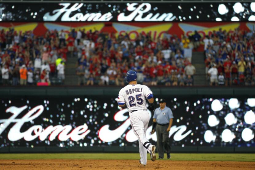 Texas Rangers catcher Geovany Soto (8) watches his solo home run in the fifth inning against...