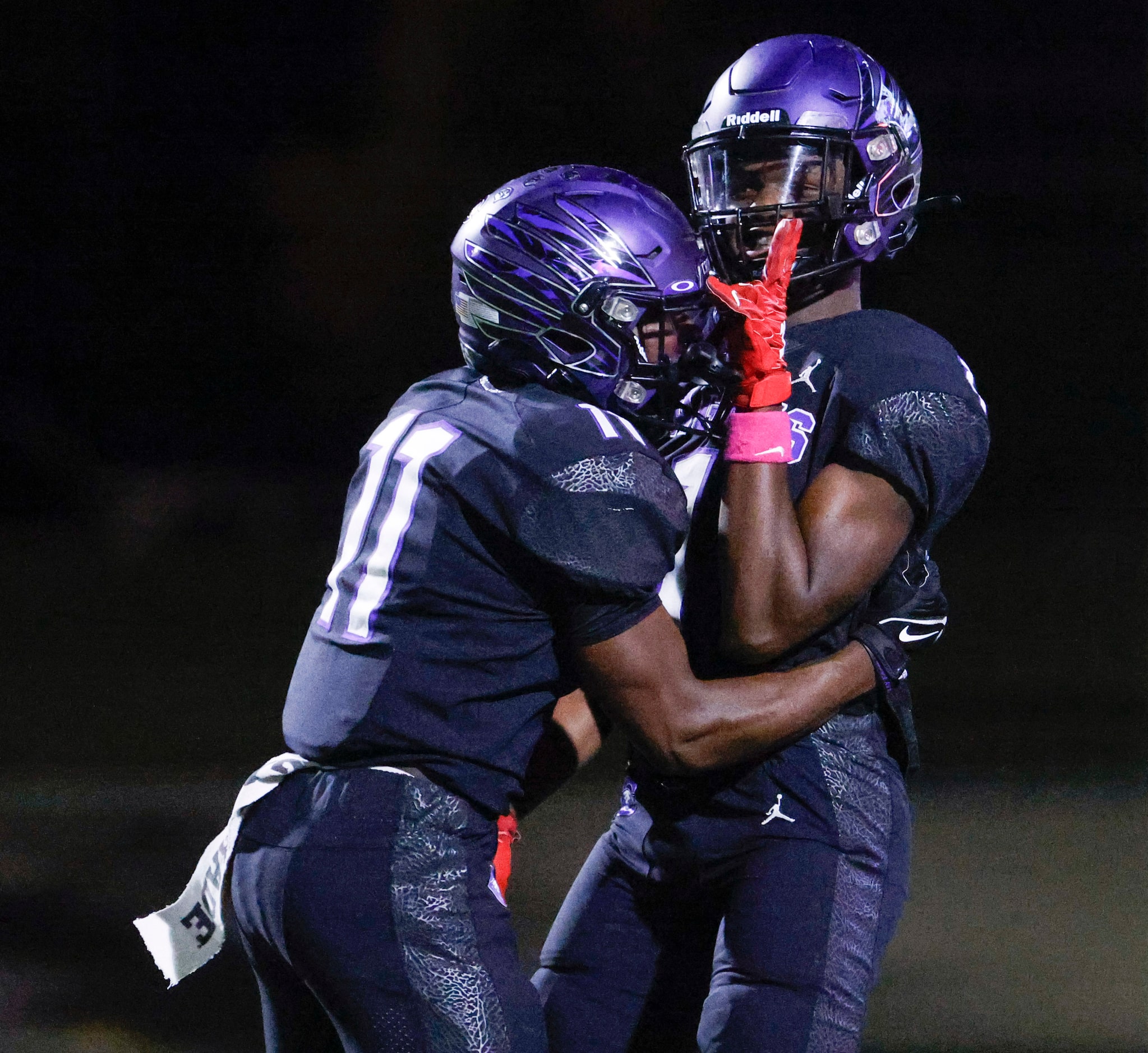 Crowley High’s Curtis Johnson (left) and Antayvious Ellis celebrate after a touchdown...