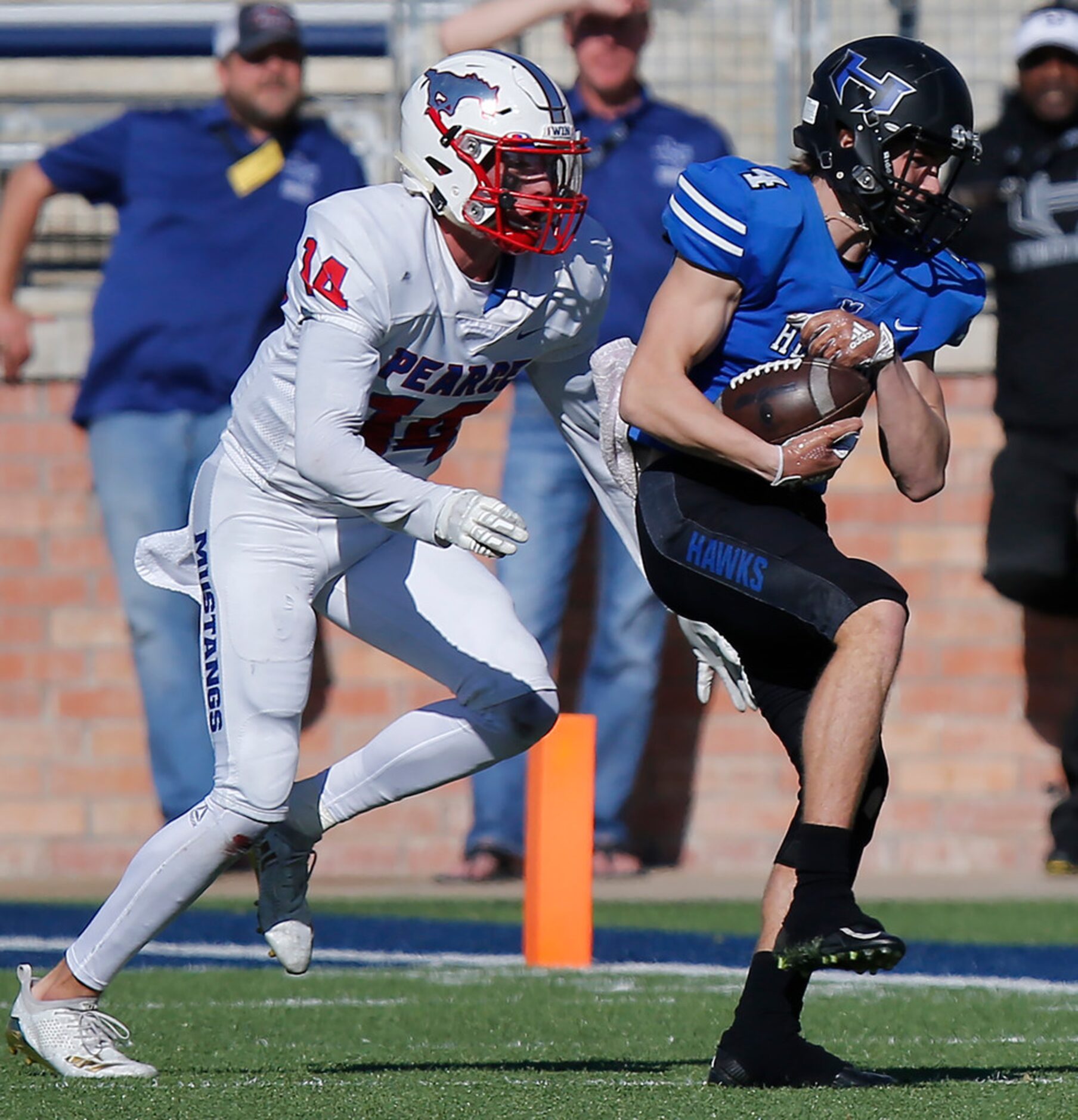 Hebron High School wide receiver Colton Bradford (4) catches a pass in front of Pearce High...