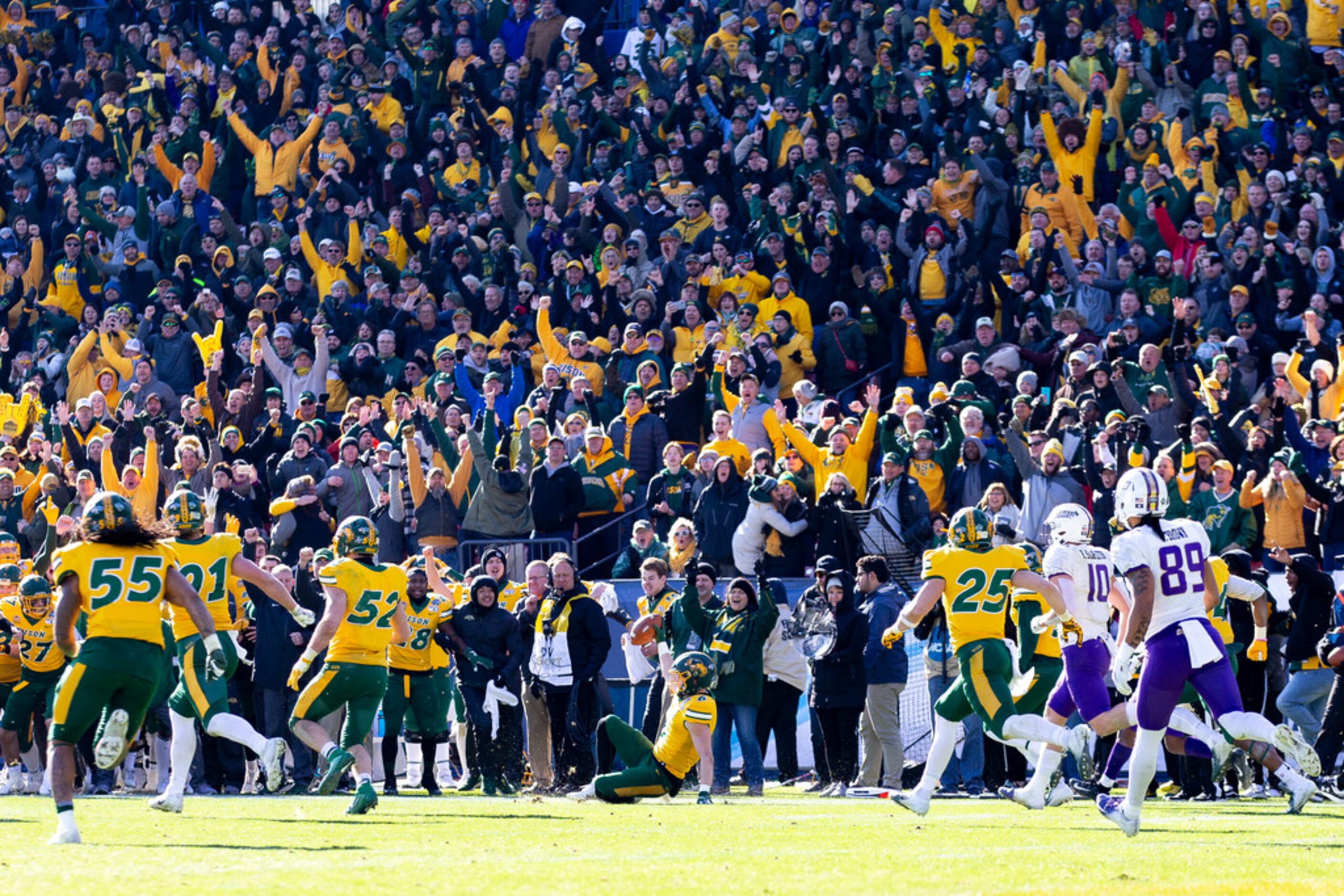 North Dakota State safety James Hendricks (6) slides on the field after intercepting a pass...