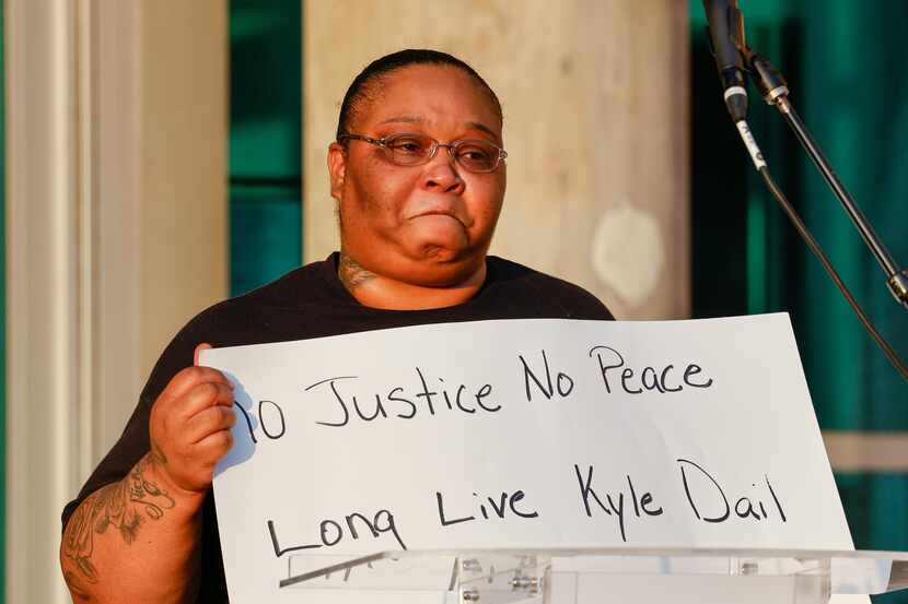 Kyle Dail’s sister Kinesha Dail, 40, talks about her brother during a protest outside the...