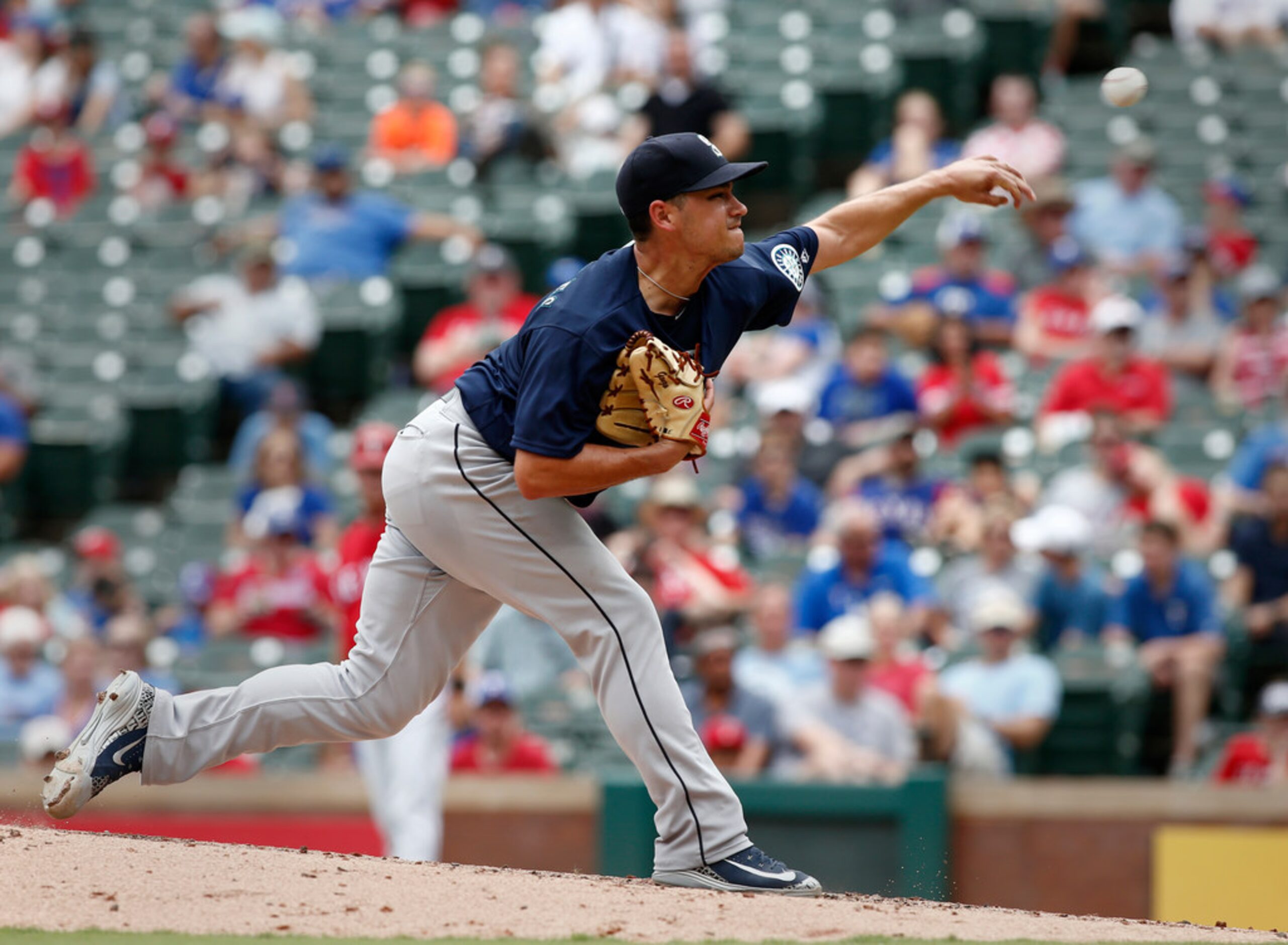 Seattle Mariners starting pitcher Marco Gonzales delivers against the Texas Rangers during...