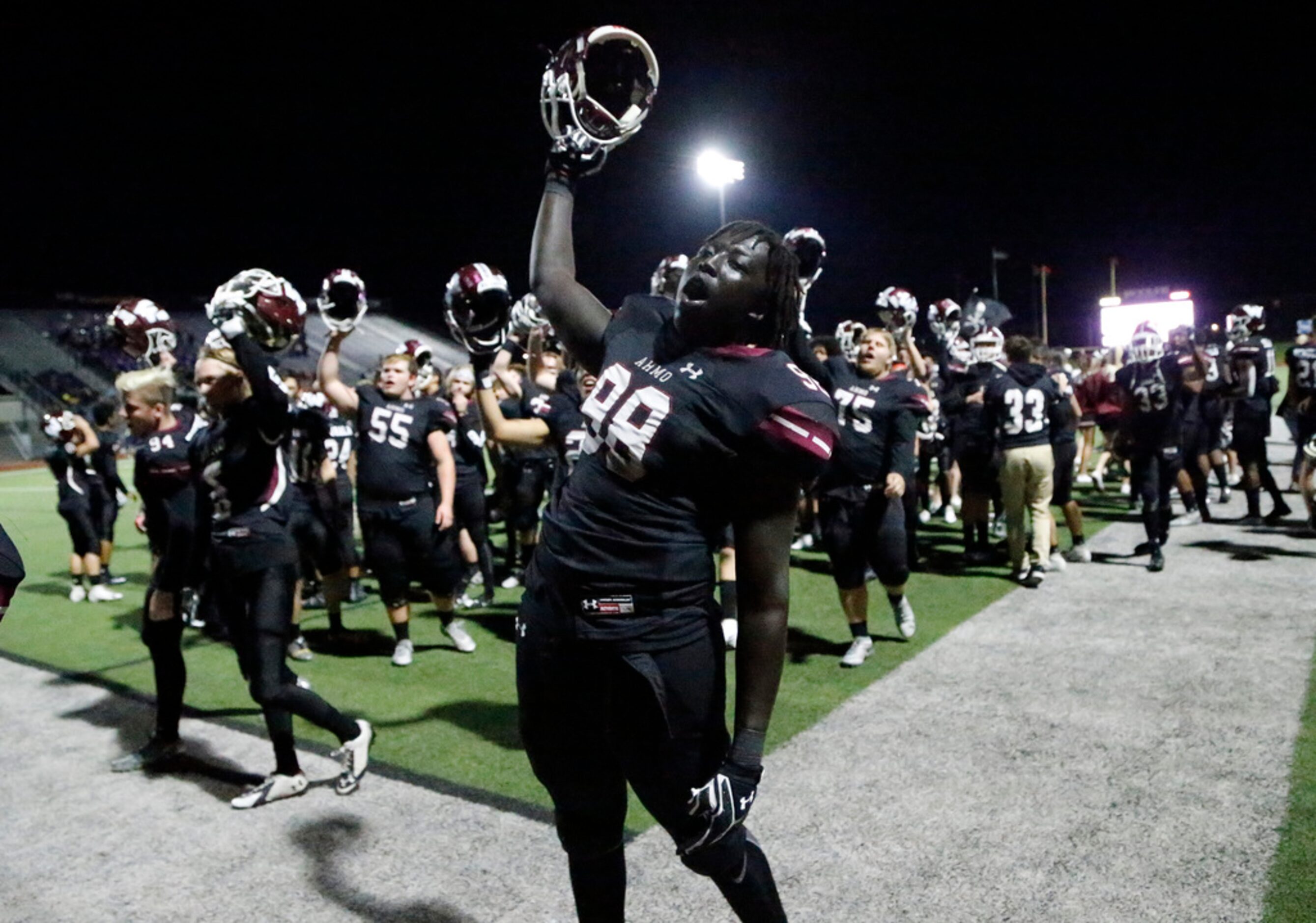 Wylie High School defensive lineman Yol Malwal (98) celebrates the victory as Wylie High...