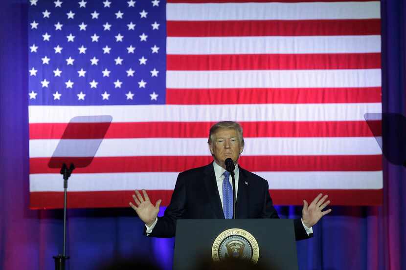 President Donald Trump addresses supporters as he speaks at the Indiana State Fairgrounds &...