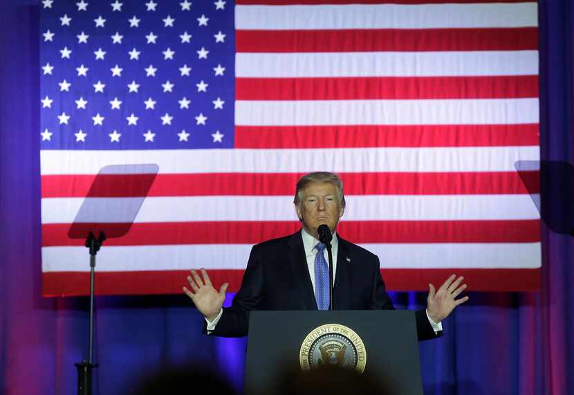 President Donald Trump addresses supporters as he speaks at the Indiana State Fairgrounds &...