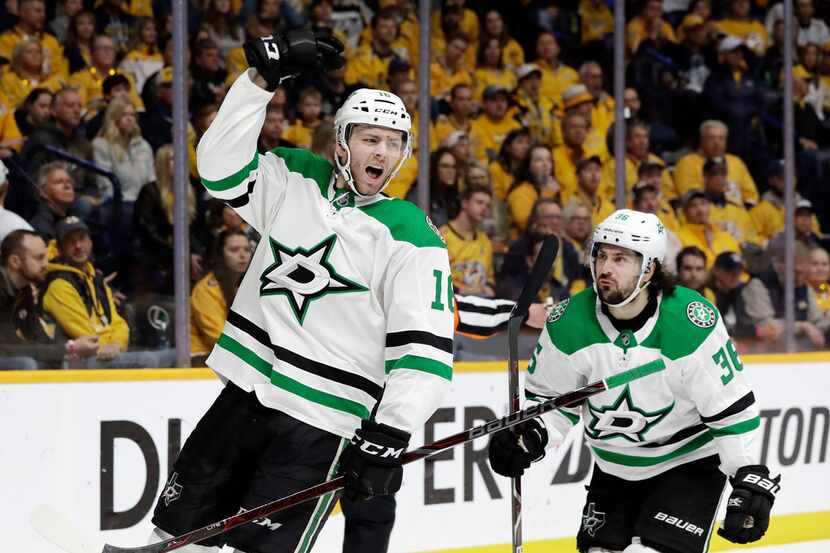 Dallas Stars center Jason Dickinson (16) celebrates after scoring a goal against the...