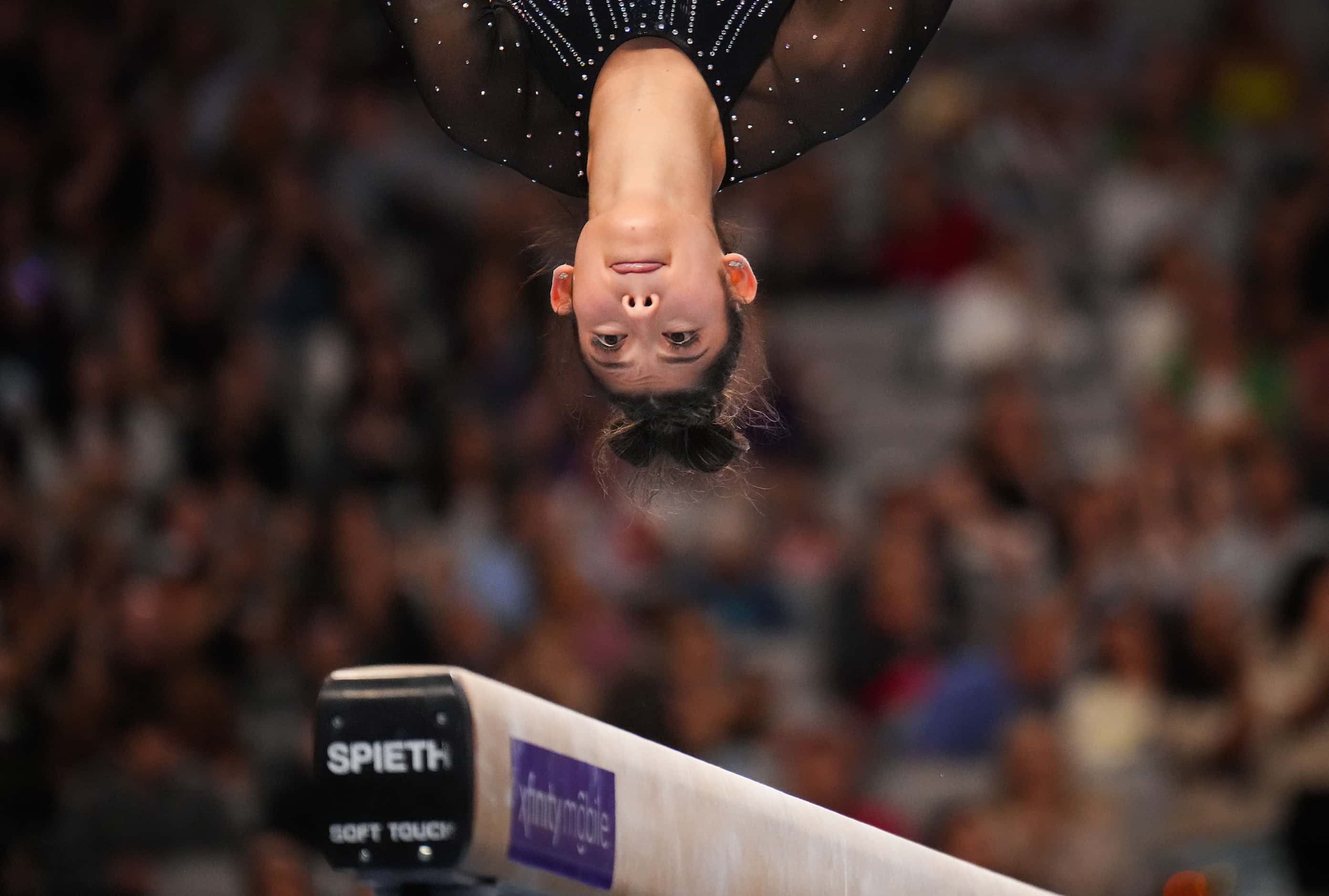 Kayla DiCello competes on the balance beam during the U.S. Gymnastics Championships on...