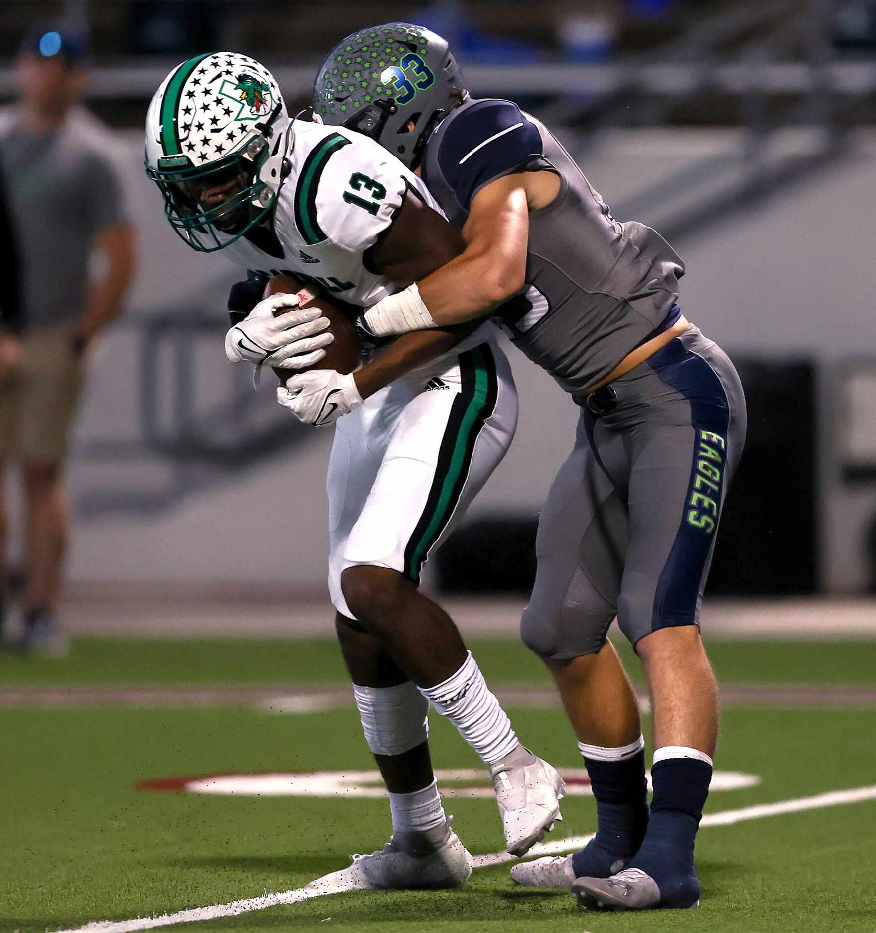 Southlake Carroll wide receiver RJ Maryland (13) comes up with a reception against Eaton...