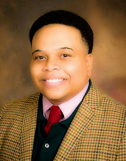 Dr. Ervin James, an associate professor at Paul Quinn College, teaches social science and...