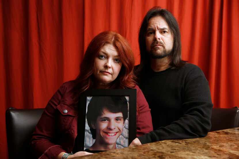 Melanie and Steve Uriegas, with a photo of their son, Jesse, who died by suicide last...