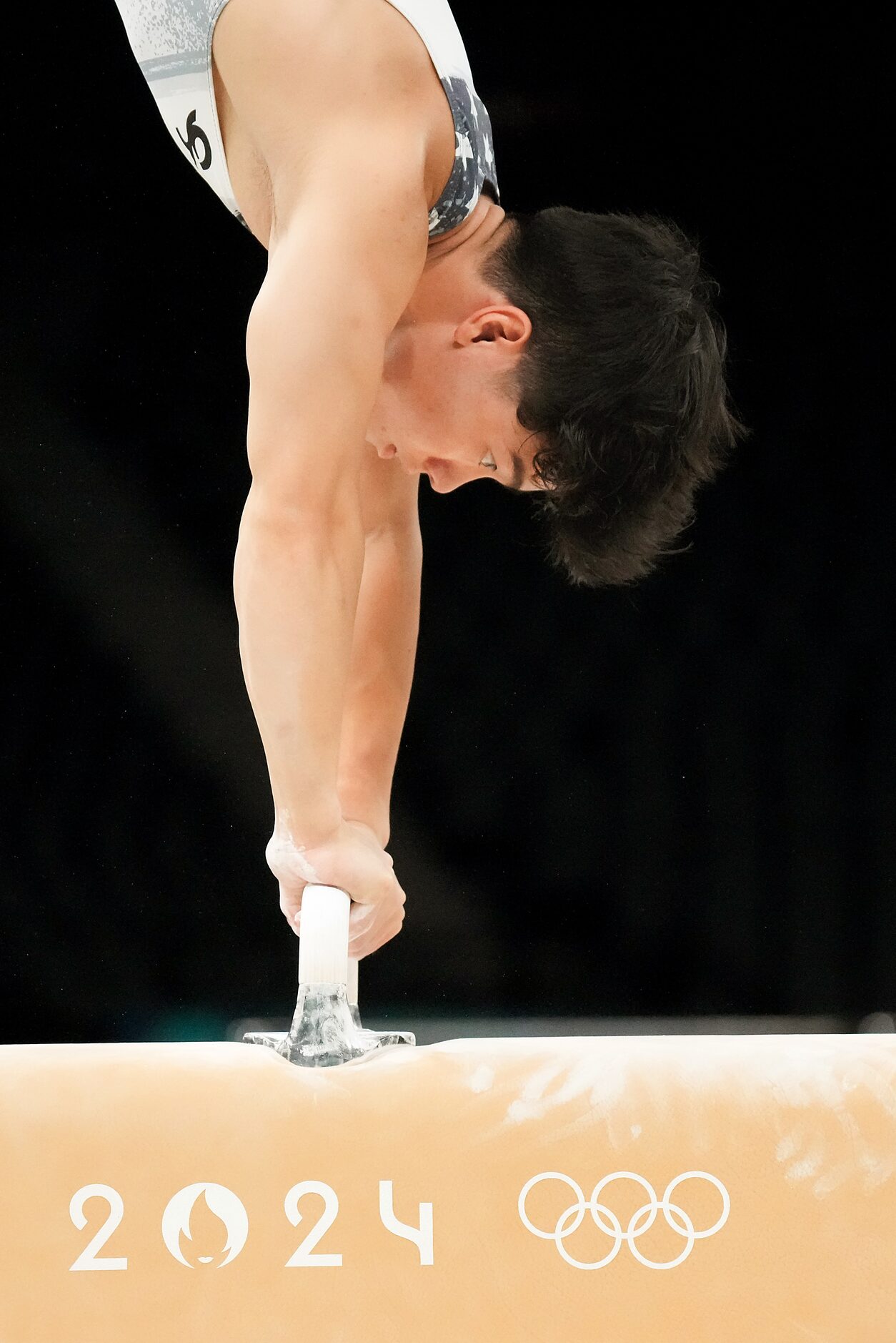 Asher Hong of the United States works on the pommel horse during gymnastics podium training...