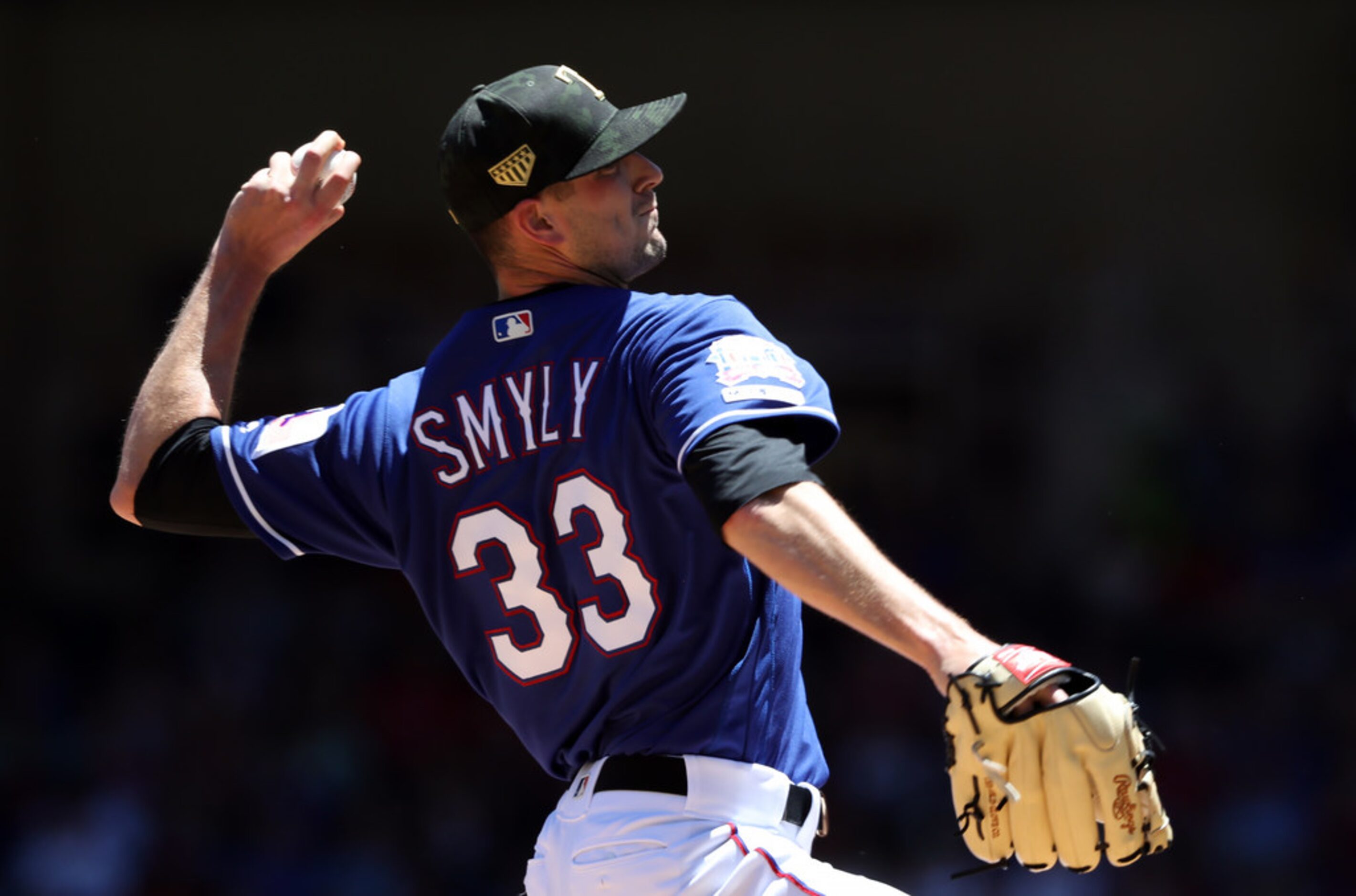 ARLINGTON, TEXAS - MAY 19: Drew Smyly #33 of the Texas Rangers throws against the St. Louis...