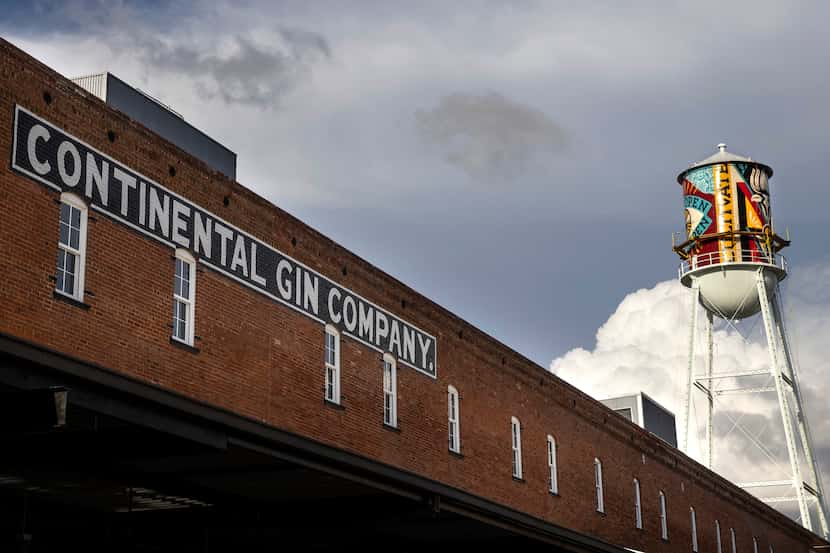 A new mural by street artist Shepard Fairey overlooks the Continental Gin Building in Deep...