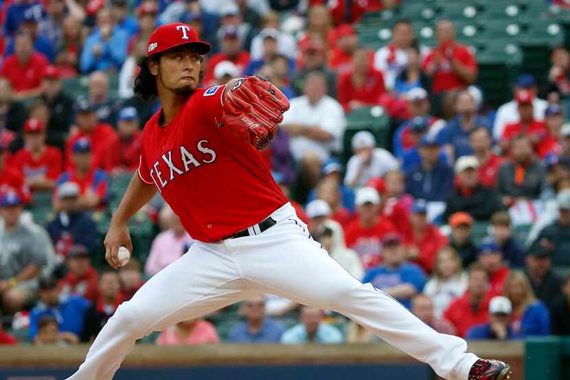 Texas Rangers starting pitcher Yu Darvish (11) throws a pitch against Toronto Blue Jays...