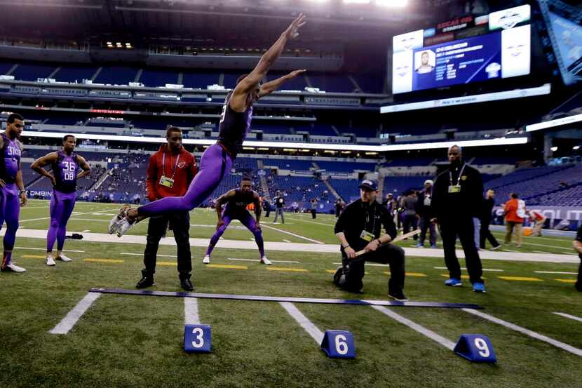 Connecticut defensive back Byron Jones runs a drill on the broad jump station at the NFL...