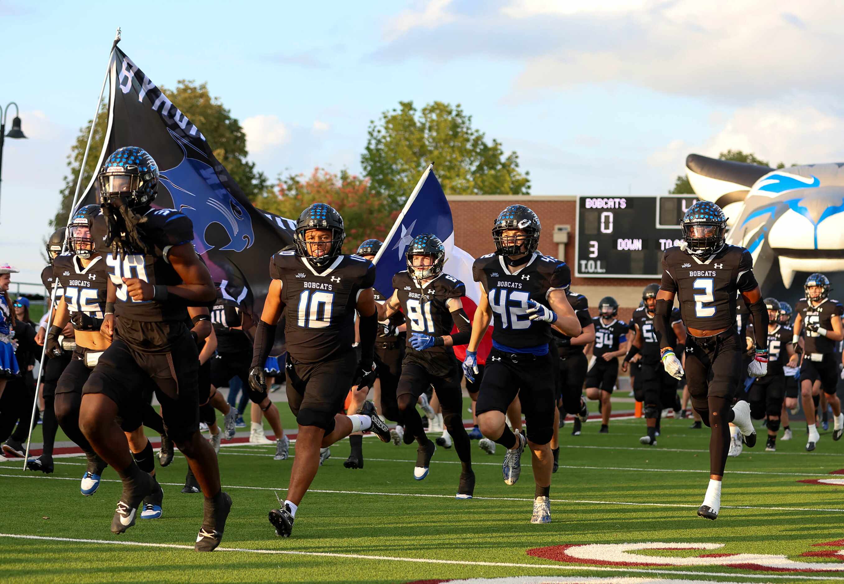 The Byron Nelson Bobcats enter the field to face Southlake Carroll in a District 4-6A high...