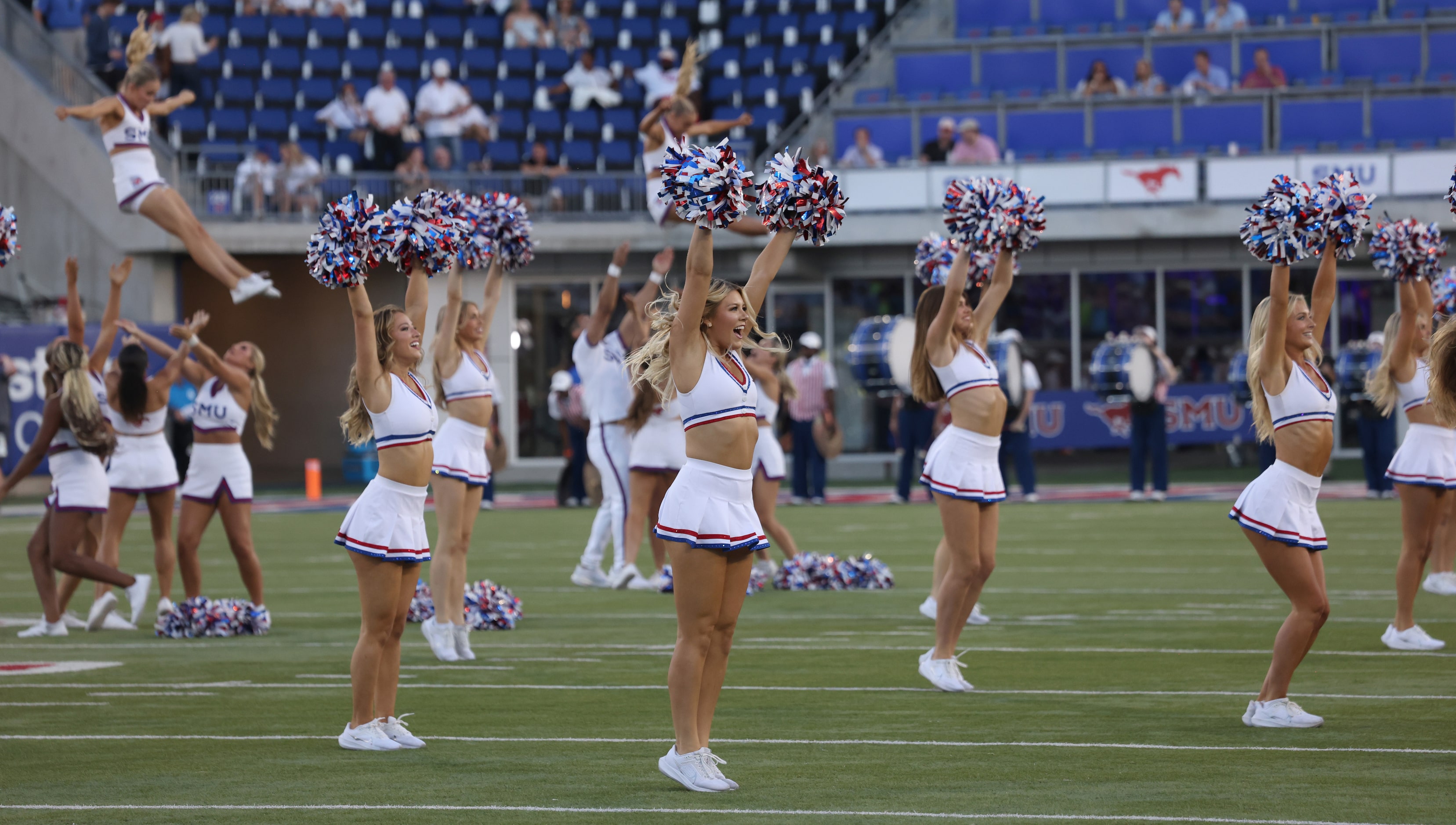 SMU Mustangs cheerleaders perform during a break between quarters of the Mustangs versus...