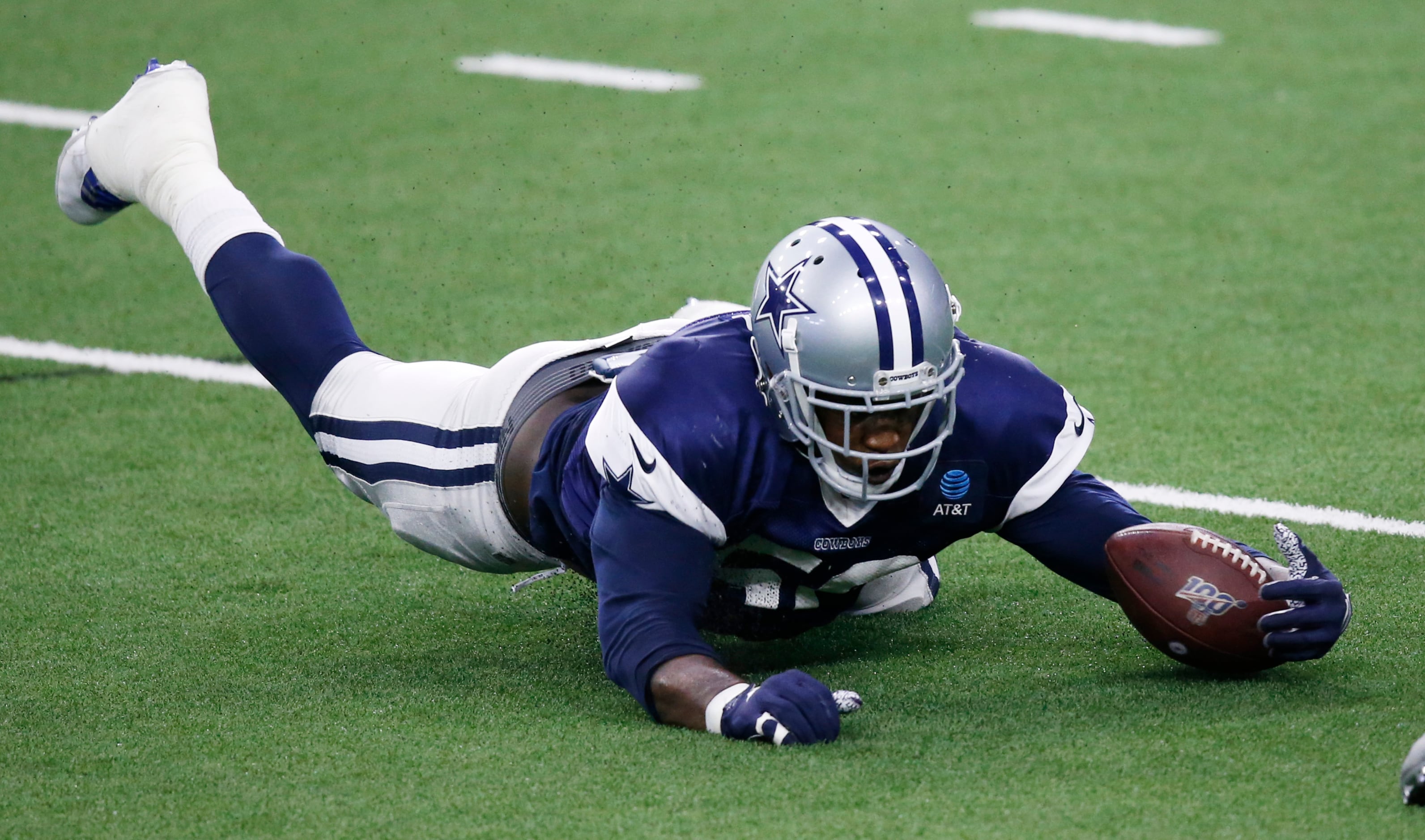 Dallas Cowboys defensive end Aldon Smith (58) dives for the fumbled ball in practice during...