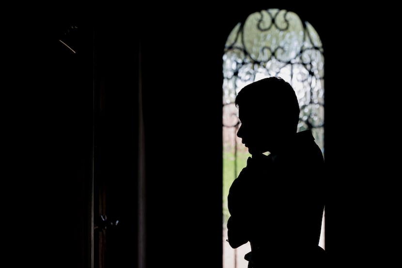 Hasan, now 13, holding his court files pose for a portrait, on Wednesday, Sept. 20, 2023, at...