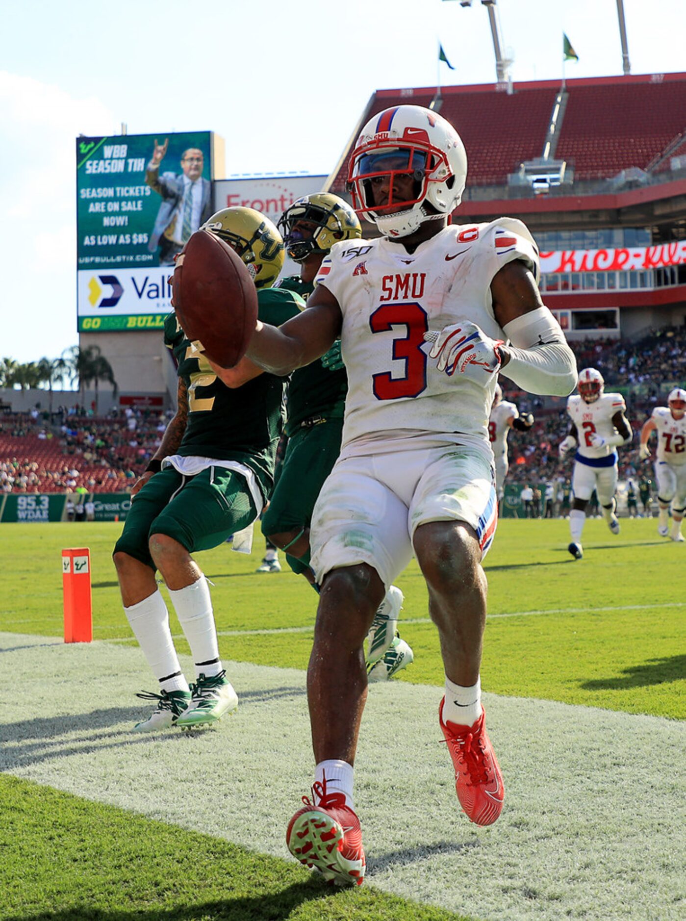 TAMPA, FLORIDA - SEPTEMBER 28: James Proche #3 of the Southern Methodist Mustangs scores a...