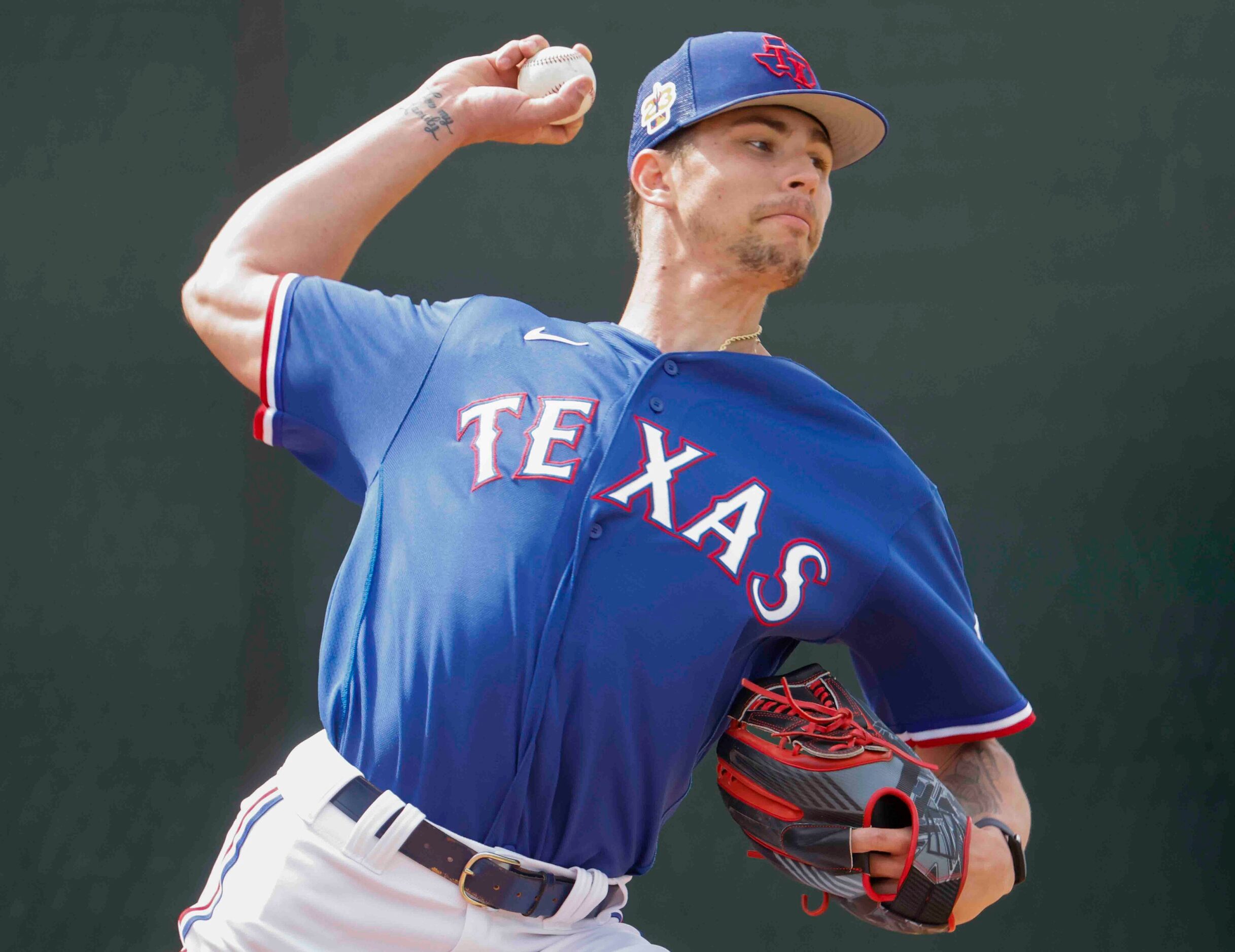 Texas Rangers pitcher Ricky Vanasco throws a pitch during a spring training workout at the...