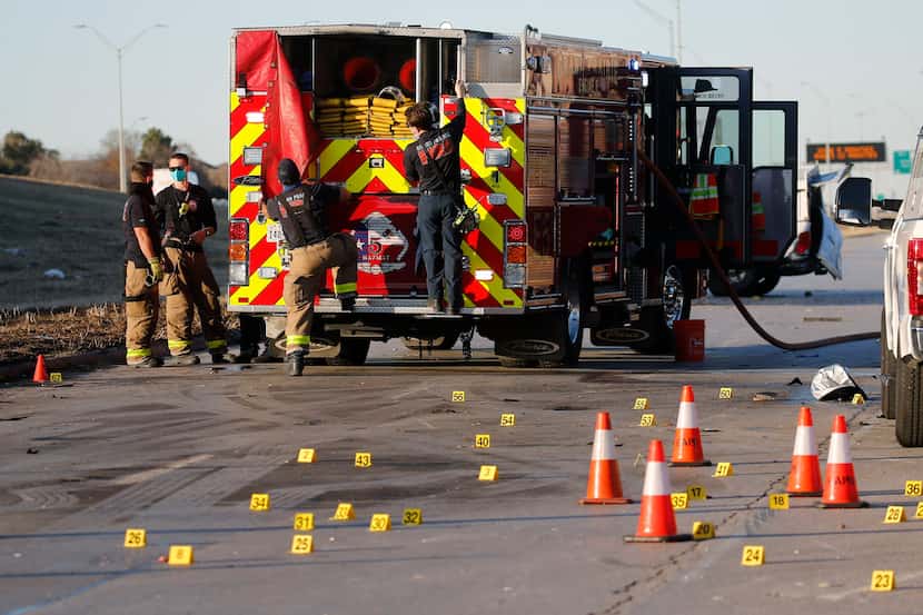 Grand Prairie firefighters at the scene of a fatal plane crash near the intersection of...
