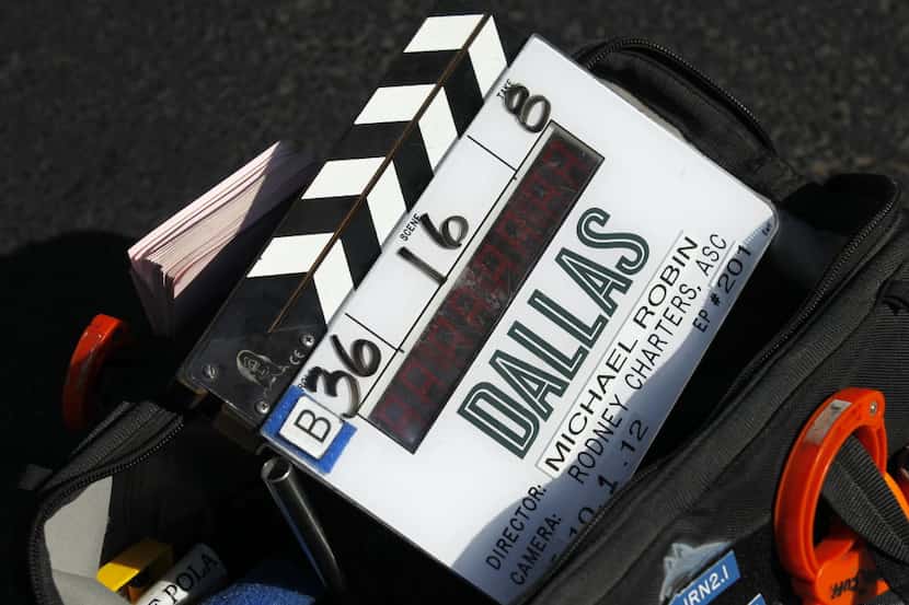 A film clapper waits for use during the "Dallas" TV show filming at Kristy Stubbs Gallery in...