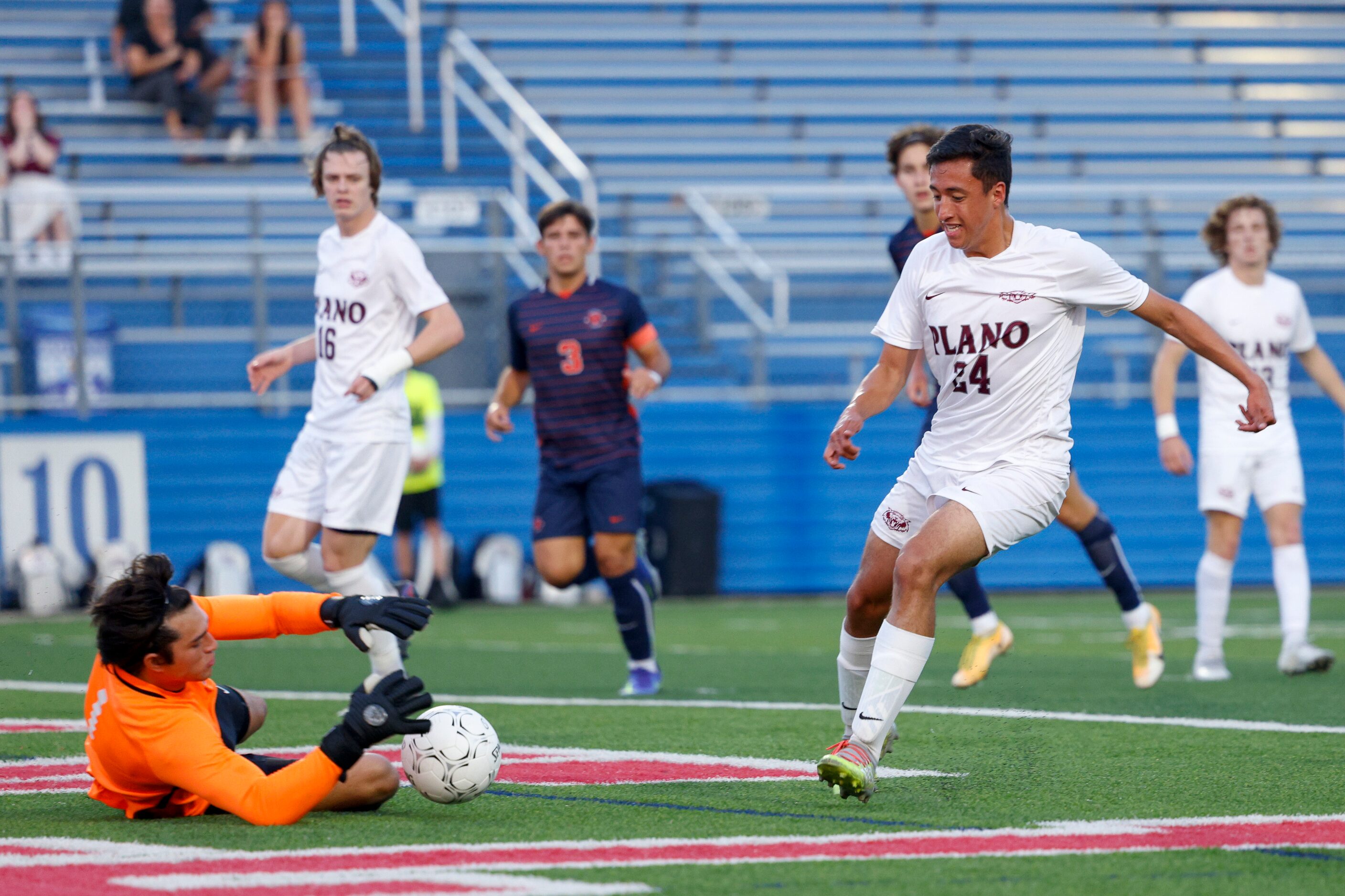 Katy Seven Lakes goalkeeper Anthony Gonzalez (1) dives to stop the ball from Plano...